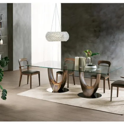 Tavolo Axis con top in vetro e base in legno massello di Pacini e Cappellini